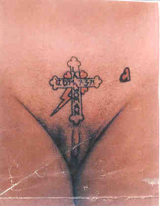 Christian Cross above vagina shaved
